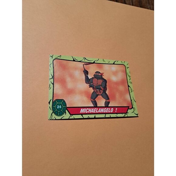 1989 Topps TMNT Michelangelo Trading Card 24 Teenage Mutant Ninja Turtles - Picture 1 of 3